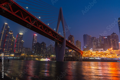 Jialing Qiansimen Bridge view of beautiful cityscape with downtown Chongqing and Jialing river modern commercial buildings in Chongqing at sunset, China. photo