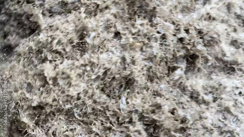 heavy flow of rainwater in the river heavy flow of rainwater in the river