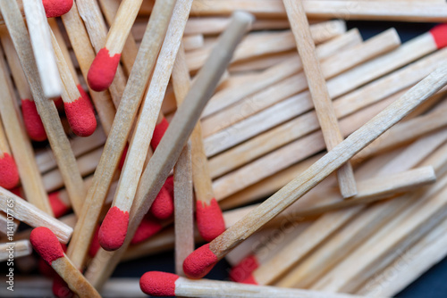 Cluttered and disorganized set of red-headed phosphor sticks