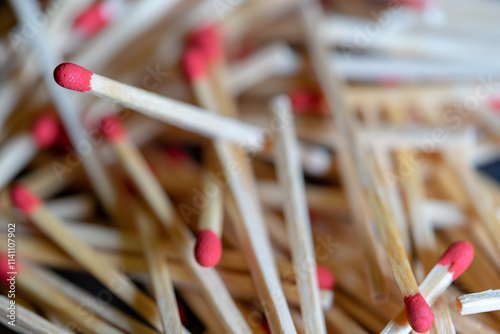 Cluttered and disorganized set of red-headed phosphor sticks