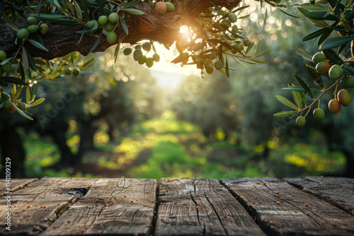 Obraz na płótnie Old wooden table for product display with natural green olive field bokeh background. ,. w salonie