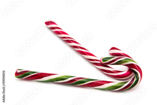 Classic glossy christmas candy cane lollipop isolated on white background. Kids festive sweets and treats. Symbol of gifts for the winter holidays.	