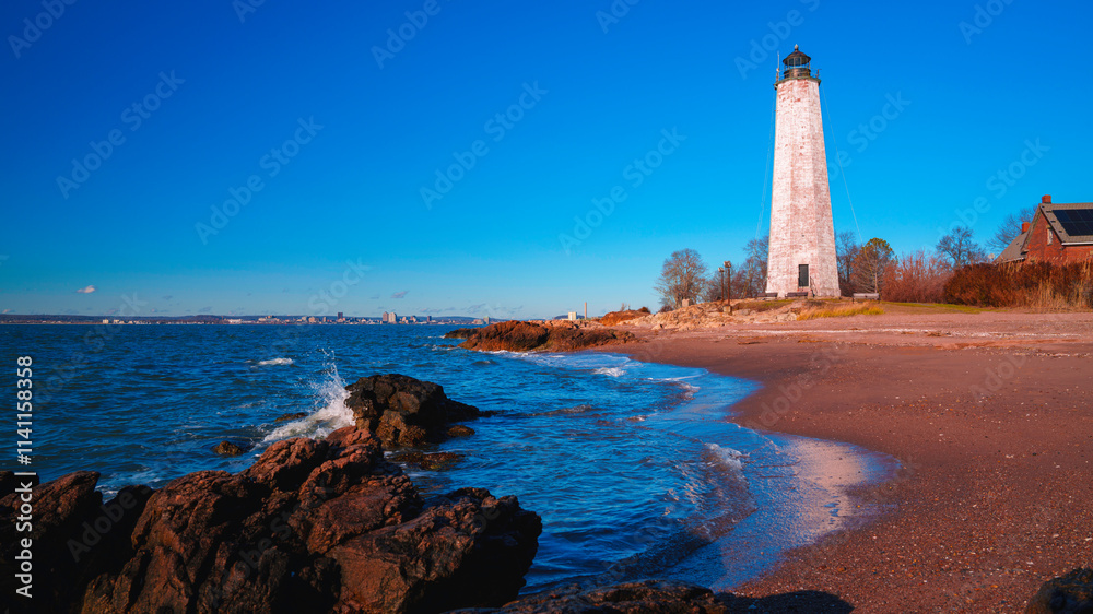New Haven Lighthouse, built in 1847, at the Lighthouse Point Park of the Eastern Beachfront of New Haven Harbor in Connecticut, United States New Haven Lighthouse, built in 1847, at the Lighthouse Point Park of the Eastern Beachfront of New Haven Harbor in Connecticut, United States