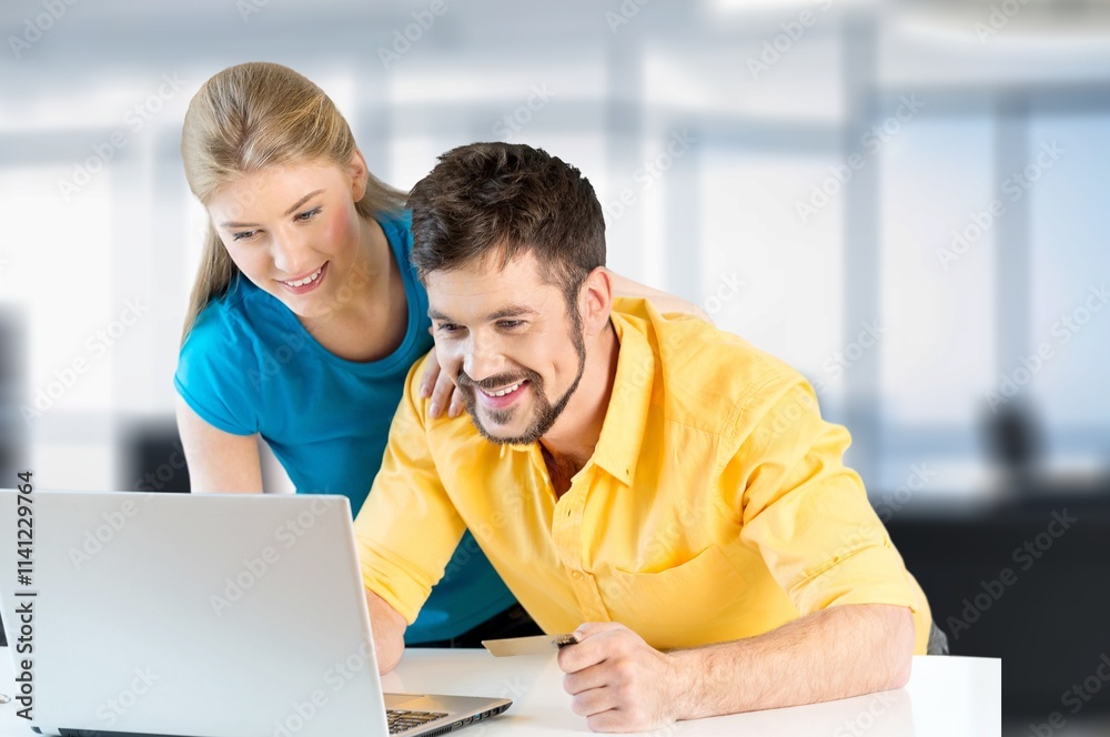 Business team working together in office. Business team working together in office.