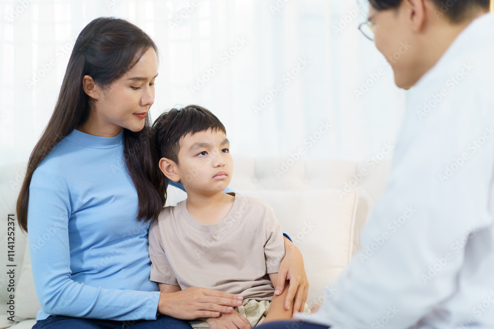 A doctor is performing a health check-up on a young boy, using a stethoscope to listen to his breathing and heartbeat. A doctor is performing a health check-up on a young boy, using a stethoscope to listen to his breathing and heartbeat.