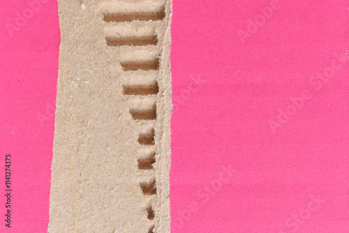 tear pink cardboard box texture background, recycle material photo