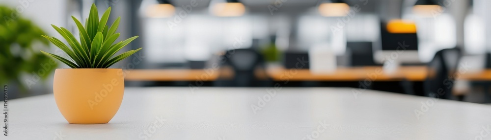 blurry background office workspace lighting concept. Office plant on a minimalist desk blurry background office workspace lighting concept. Office plant on a minimalist desk