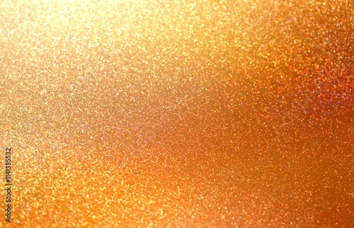 Golden yellow shimmer texture. Glittering empty background for festive decor.