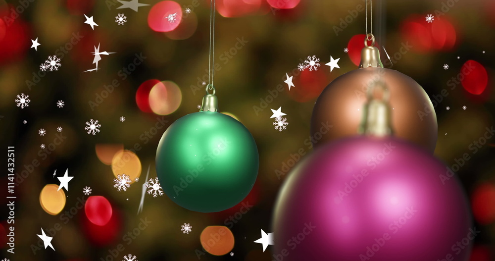 Image of shiny christmas baubles with white stars and flashing yellow lights Image of shiny christmas baubles with white stars and flashing yellow lights