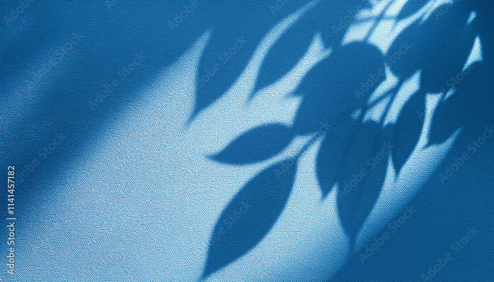 Obraz premium Blue Textured Background with Leaf Shadows Sunlight