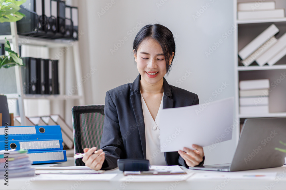 Business asian woman working at office with documents on desk, doing planning analyzing the financial report, business plan investment, finance analysis concept
Business asian woman working at office with documents on desk, doing planning analyzing the financial report, business plan investment, finance analysis concept