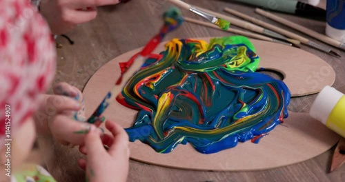 Wallpaper Mural Vibrant and Colorful Paint Swirls Beautifully Arranged on Palette in Creative Workspace Torontodigital.ca