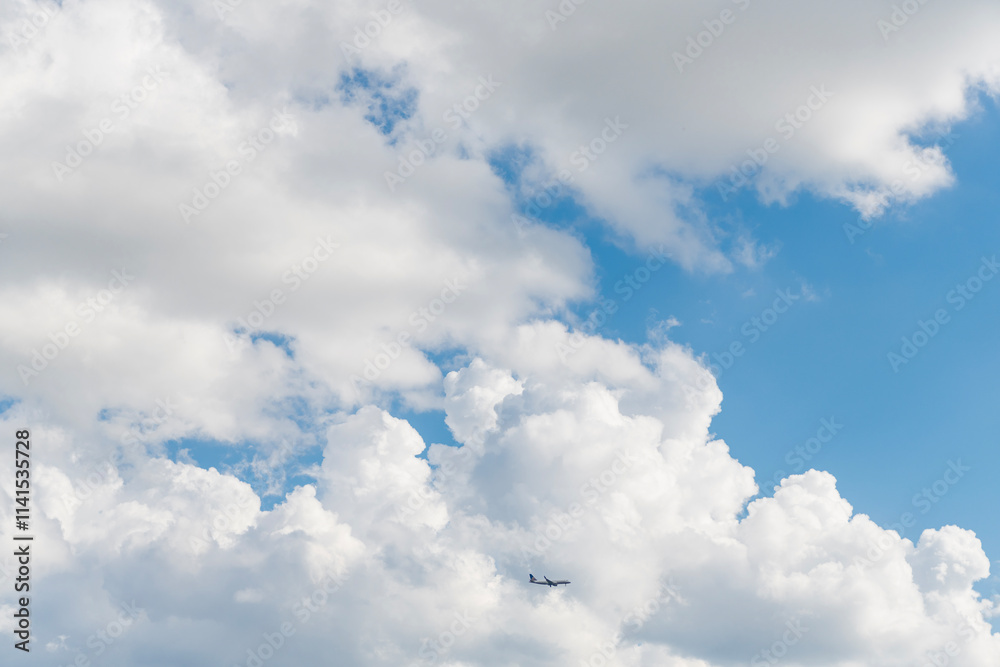 Sky with white cloud. Beauty white cloudy on blue sky with soft sun light, Nature view soft white clouds on pastel blue sky background Sky with white cloud. Beauty white cloudy on blue sky with soft sun light, Nature view soft white clouds on pastel blue sky background