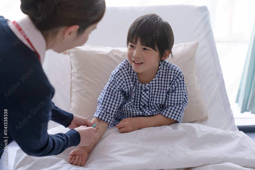 看護師と患者の男の子 看護師と患者の男の子