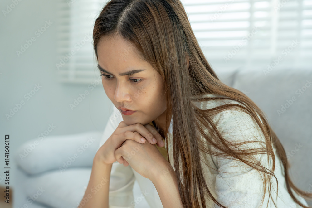 Depression and mental illness. Asian woman disappointed, sad after receiving bad news. Stressed girl confused with unhappy problems, arguing with boyfriend, cry and worry about unexpected pregnancy. Depression and mental illness. Asian woman disappointed, sad after receiving bad news. Stressed girl confused with unhappy problems, arguing with boyfriend, cry and worry about unexpected pregnancy.