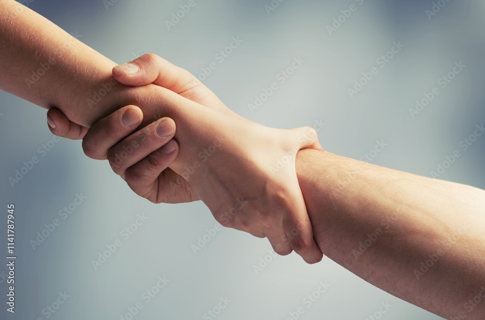 Couple of helping hand on blur background Couple of helping hand on blur background