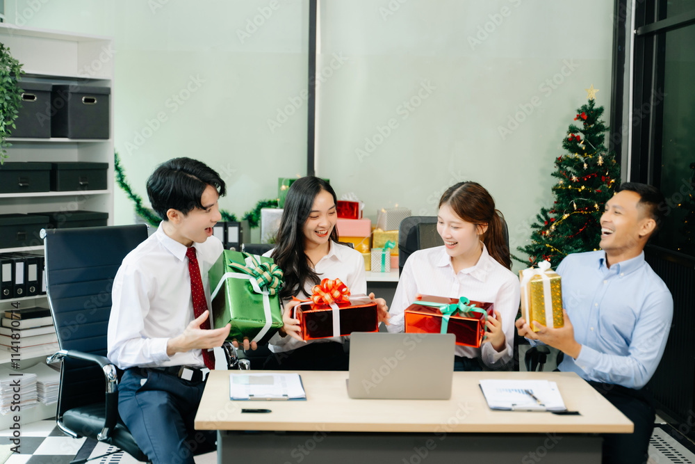 Celebrate Christmas with colleagues in a joyful office party setting, sharing gifts, laughs, and holiday Celebrate Christmas with colleagues in a joyful office party setting, sharing gifts, laughs, and holiday