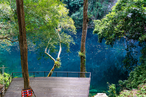 Aerial view of beautiful sinkhole name Lom Phu Khiew or Blue Lake in Ngao District, Lampang Province, Thailand. photo