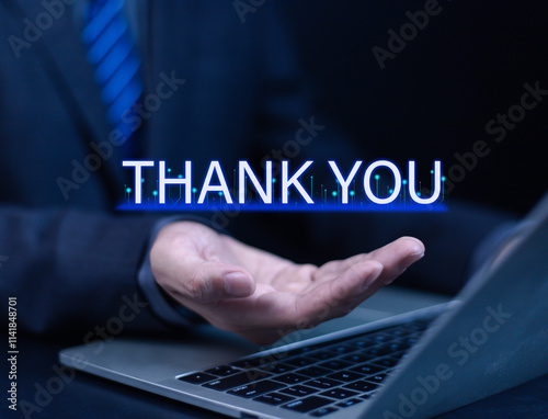 Obraz na płótnie Businessman using laptop and showing thank you message