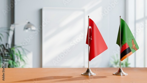 FLAGS OF TURKEY AND ZAMBIA ON TABLE photo