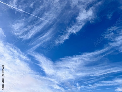 Full frame of pretty blue sky with unusual scudding cloud formation