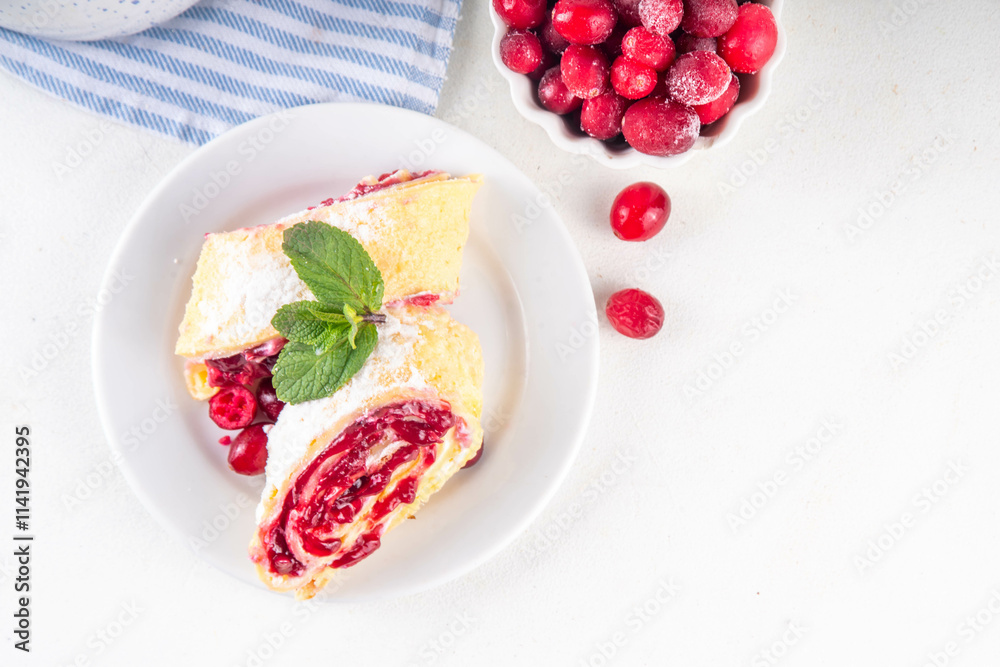 Cranberry strudel, winter roll dessert with cranberry jam Cranberry strudel, winter roll dessert with cranberry jam