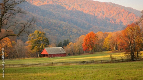 Peaceful Rural Landscape with Red Barn and Autumn Foliage photo