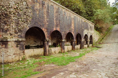 Ancien lavoir médiéval du village photo