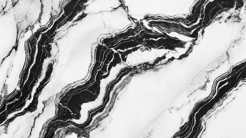 Black and White Marble Texture: Elegant swirls of black and white create a luxurious marble texture, perfect for design projects needing a sophisticated and stylish backdrop.
