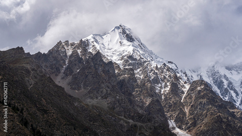 Scenic detail view of Nanga Parbat north face with Rakhiot peak under cloudy sky, Tarishing, Astore, Gilgit-Baltistan, Pakistan photo