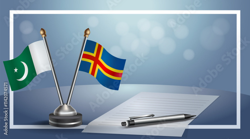 Pakistan and Aland Islands National flags on small table with bokeh background, cooperative relationship