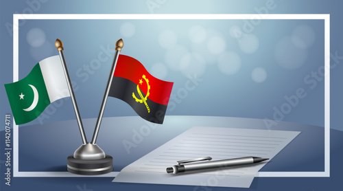 Pakistan and Angola National flags on small table with bokeh background, cooperative relationship