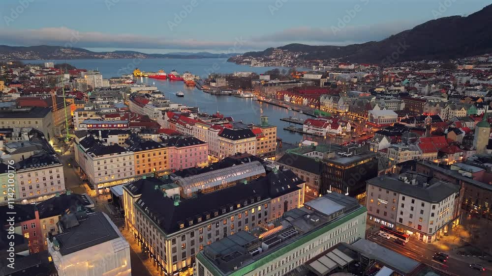 Night aerial of historic city Bergen, Norway colourful wooden warehouses harbour