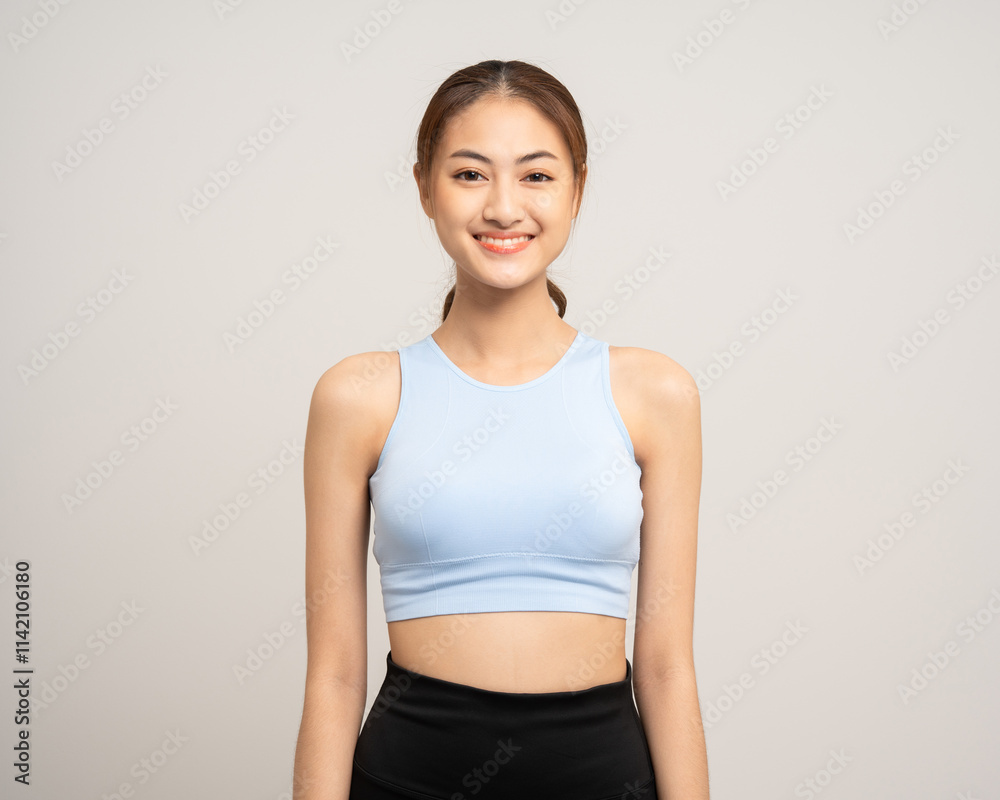 Young beautiful smiling asian woman with sportswear on isolated white background. Portrait happy healthy slim fit and firm attractive sporty woman standing pose exercise workout in studio. Young beautiful smiling asian woman with sportswear on isolated white background. Portrait happy healthy slim fit and firm attractive sporty woman standing pose exercise workout in studio.