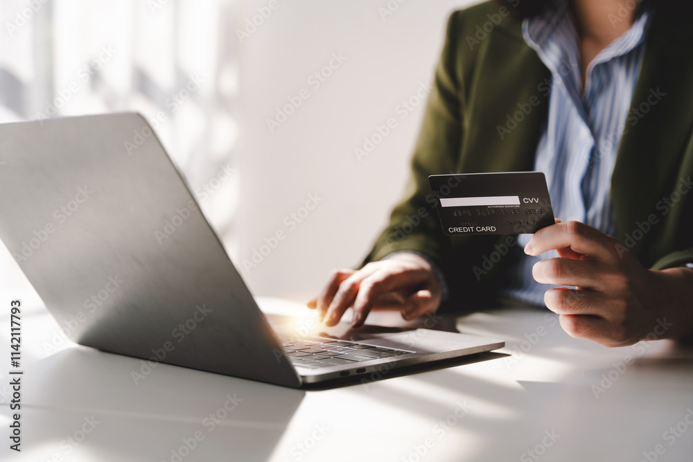 Portrait of entering credit card information on a laptop. Shopping online credit card login Portrait of entering credit card information on a laptop. Shopping online credit card login