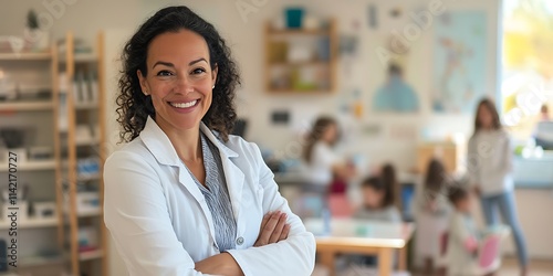 Female child psychologist standing warmly in a family clinic for stock photo