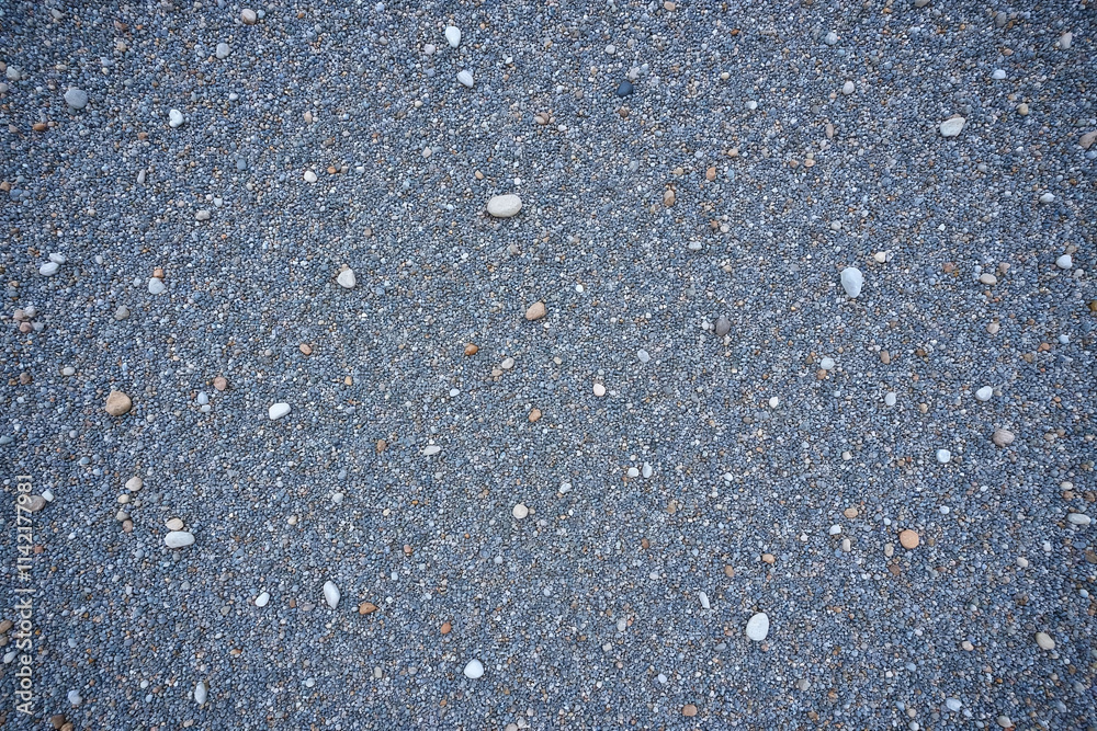 Gray granite gravel in detailed overhead view Gray granite gravel in detailed overhead view
