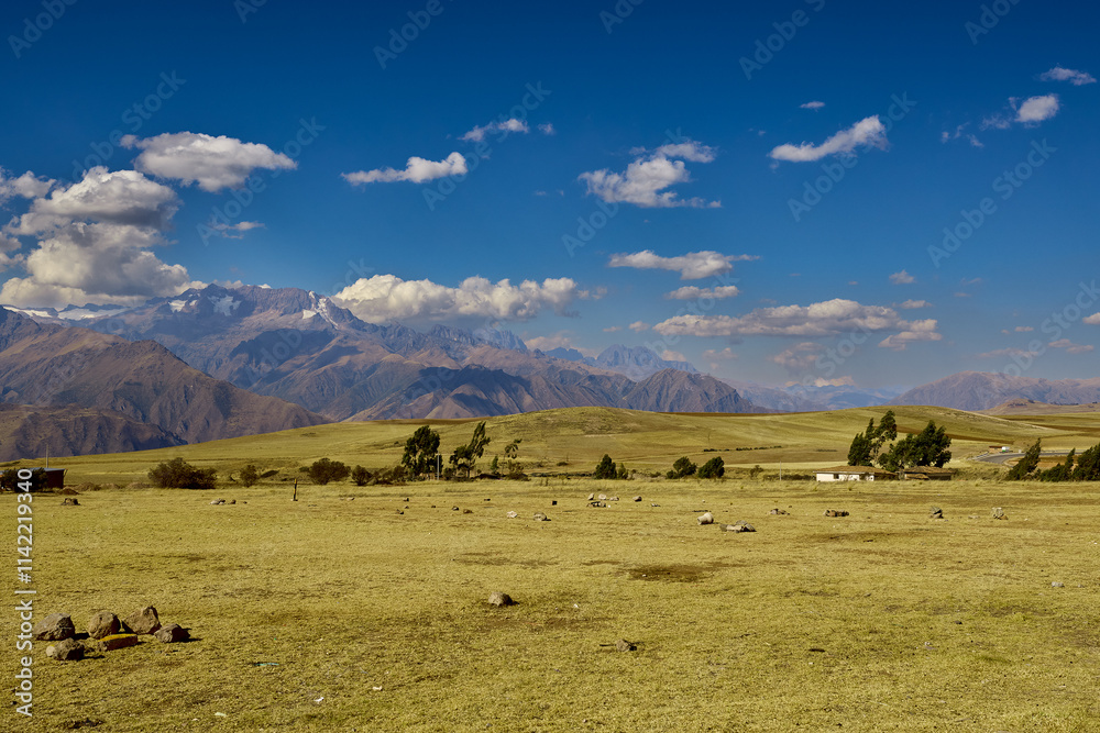 The breathtaking landscapes of Maras, with the majestic Sacred Valley in the background.Rolling hills, rugged Andean terrain, and vibrant natural colors paint a scene of serenity and grandeur. The breathtaking landscapes of Maras, with the majestic Sacred Valley in the background.Rolling hills, rugged Andean terrain, and vibrant natural colors paint a scene of serenity and grandeur.
