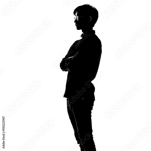 Silhouette of a pensive young man.