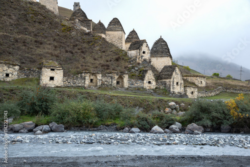 Dargavs in the morning fog. North Ossetia, Russia photo