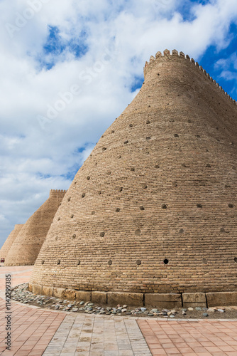 Ark of Bukhara under blue cloudy sky on a sunny summer day photo