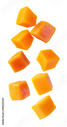 Fotografie Diced pumpkin cubes in mid air isolated on transparent background