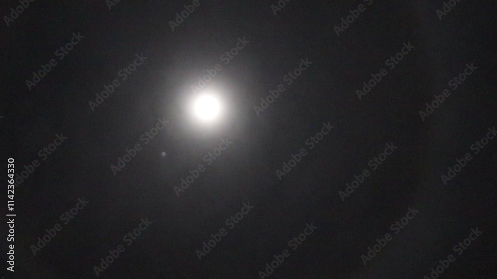 Full Moon Halo Surrounded by Misty Night Sky Atmospheric Phenomenon with Glowing Light Circle Effect Captured in Dark Cloudy Environment Natural Optical Illusion in Astronomy and Weather Photography Full Moon Halo Surrounded by Misty Night Sky Atmospheric Phenomenon with Glowing Light Circle Effect Captured in Dark Cloudy Environment Natural Optical Illusion in Astronomy and Weather Photography