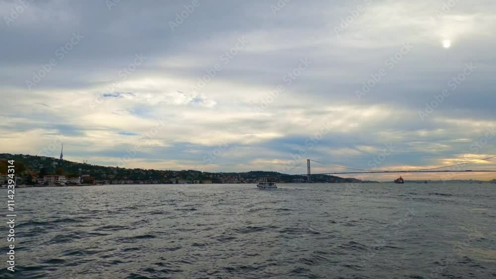 view of Istanbul skyline and ships during a cruise on Bosphorus, Turkey, city architecture, popular tourist destination, hyperlapse
view of Istanbul skyline and ships during a cruise on Bosphorus, Turkey, city architecture, popular tourist destination, hyperlapse