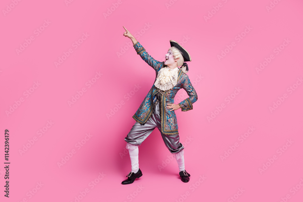 Elegant gentleman wearing baroque costume poses against a vibrant pink background, embracing historic style Elegant gentleman wearing baroque costume poses against a vibrant pink background, embracing historic style
