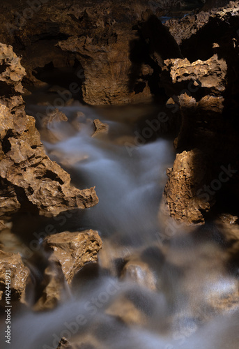 Water running through the cave in Burgos. North of Spain