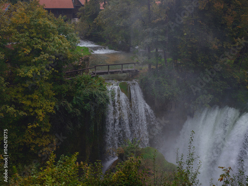 Travel to Village of Rastoke near Slunj in Croatia. Breathtaking view old water mills on waterfalls of Korana river, beautiful countryside landscape photo