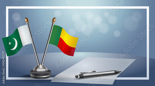 Pakistan and Benin National flags on small table with bokeh background, cooperative relationship