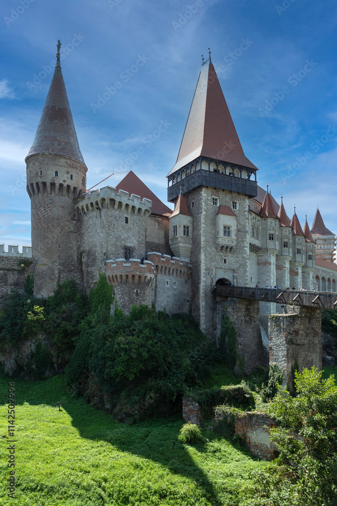 Romania Corvin Castle on a cloudy summer day Romania Corvin Castle on a cloudy summer day