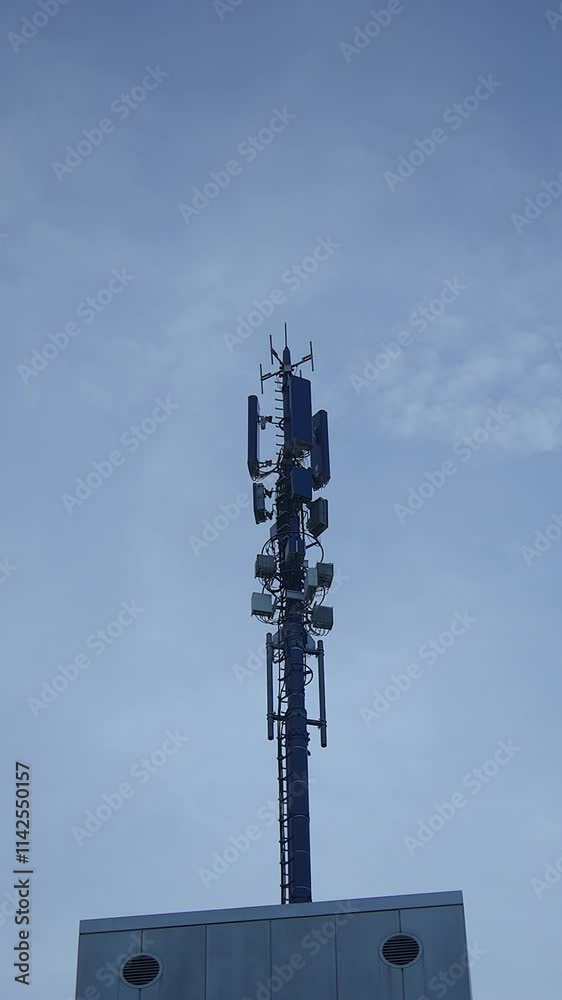 A stunning dusklit telecommunication tower, serving as a vital city communication hub A stunning dusklit telecommunication tower, serving as a vital city communication hub